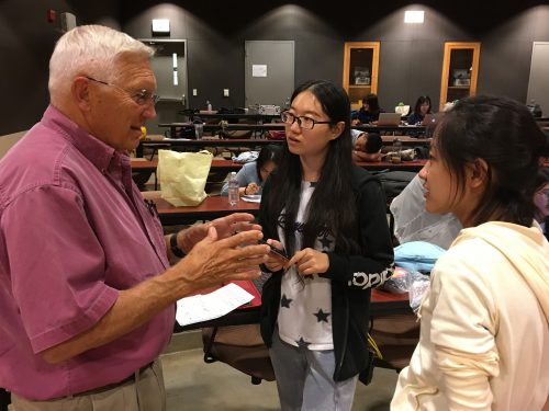 Dr. Bennie Osburn mentors students during One Health Conference